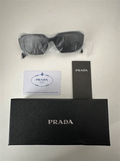 Prada Sunglasses via David Jones • with receipt .